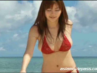 Japanese Babe Ai Kawanaka Flaunts Her Huge Tits in Porn Video